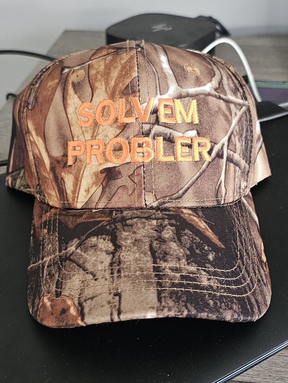 SOLVEM PROBLER Camo Baseball Cap with Orange Embroidery